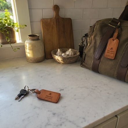 Leather luggage tags with logo debossing - customer photo